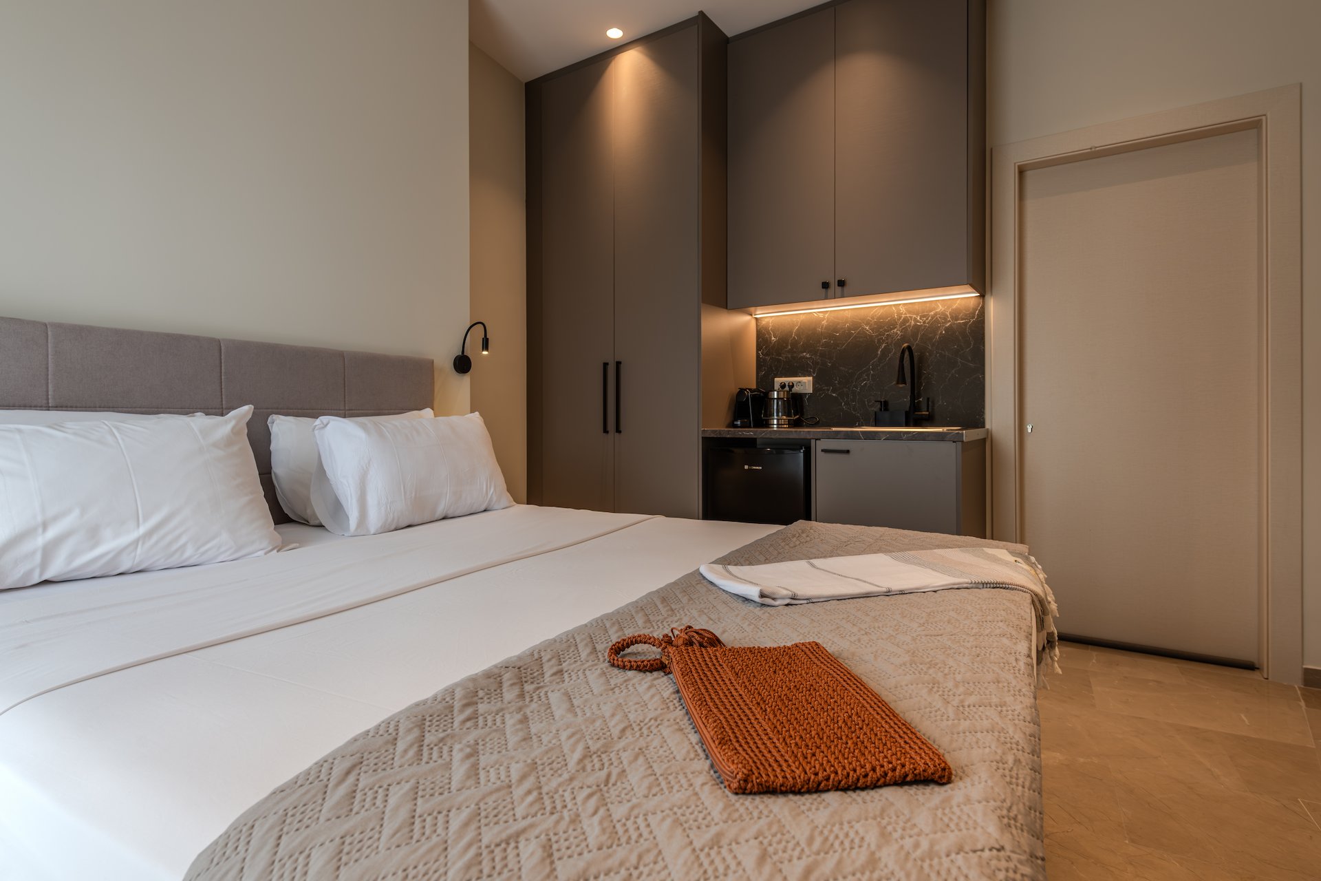 Superior Suite with Side Sea View - interior at Noma Suites Tolo